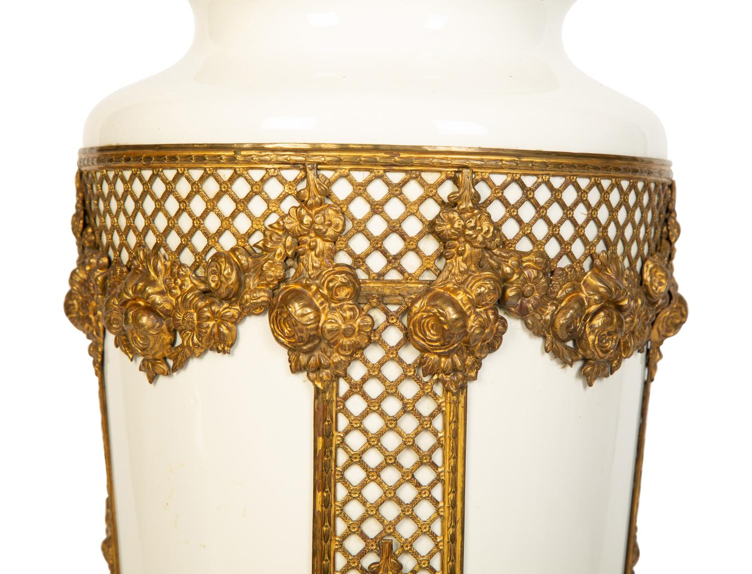A Continental Gilt Metal Mounted Porcelain Vase