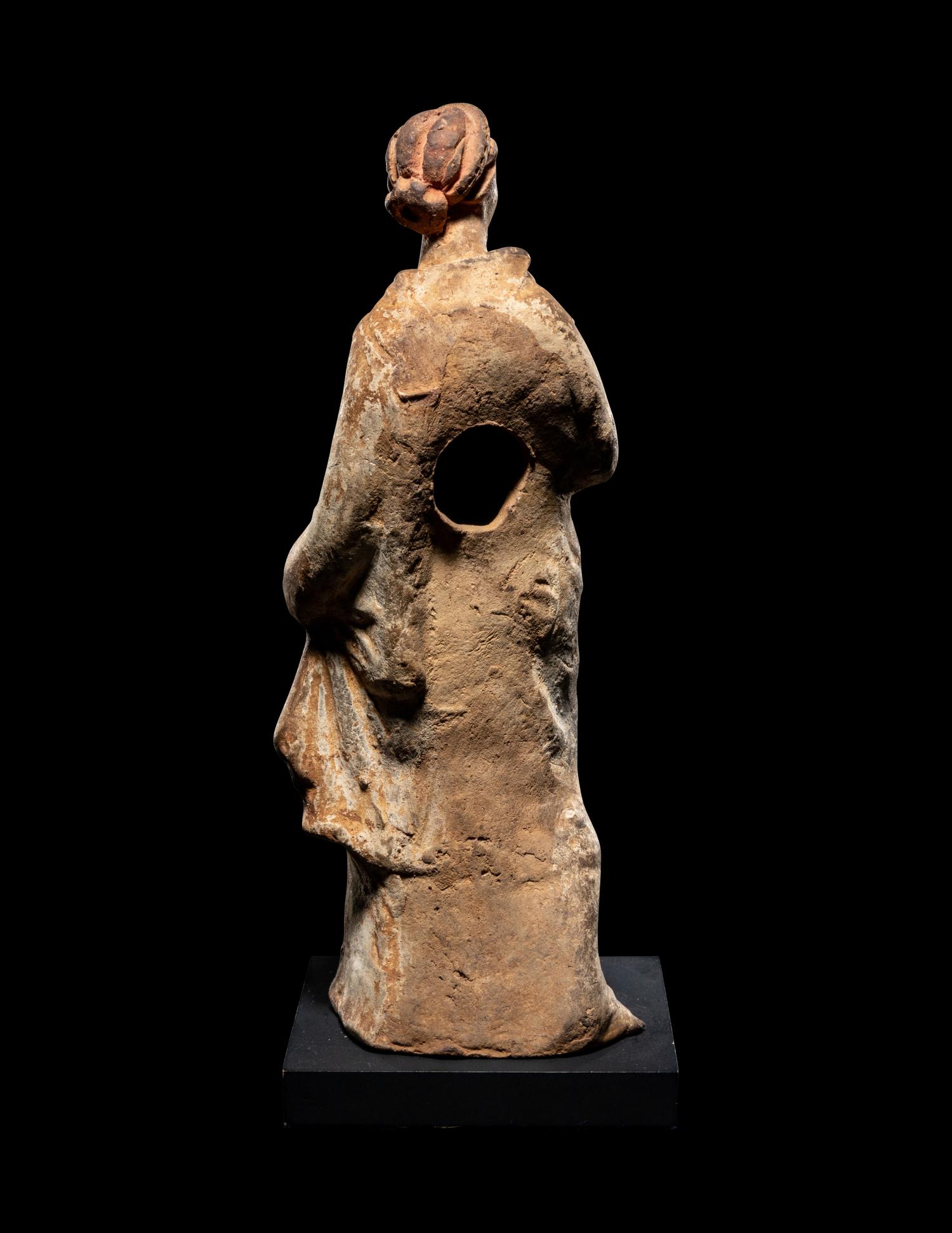 A Greek Terra Cotta Draped Female Figure