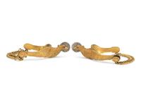 Ornate privately purchased brass eagle spurs.
