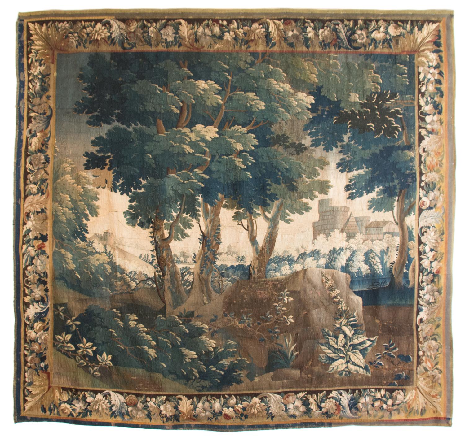 A Flemish Silk and Wool Verdure Tapestry 9 feet 10 inches x 7 feet 5 inches. — MID 18TH CENTURY