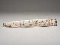 A Scrimshaw Carved Whale's Rib Bone