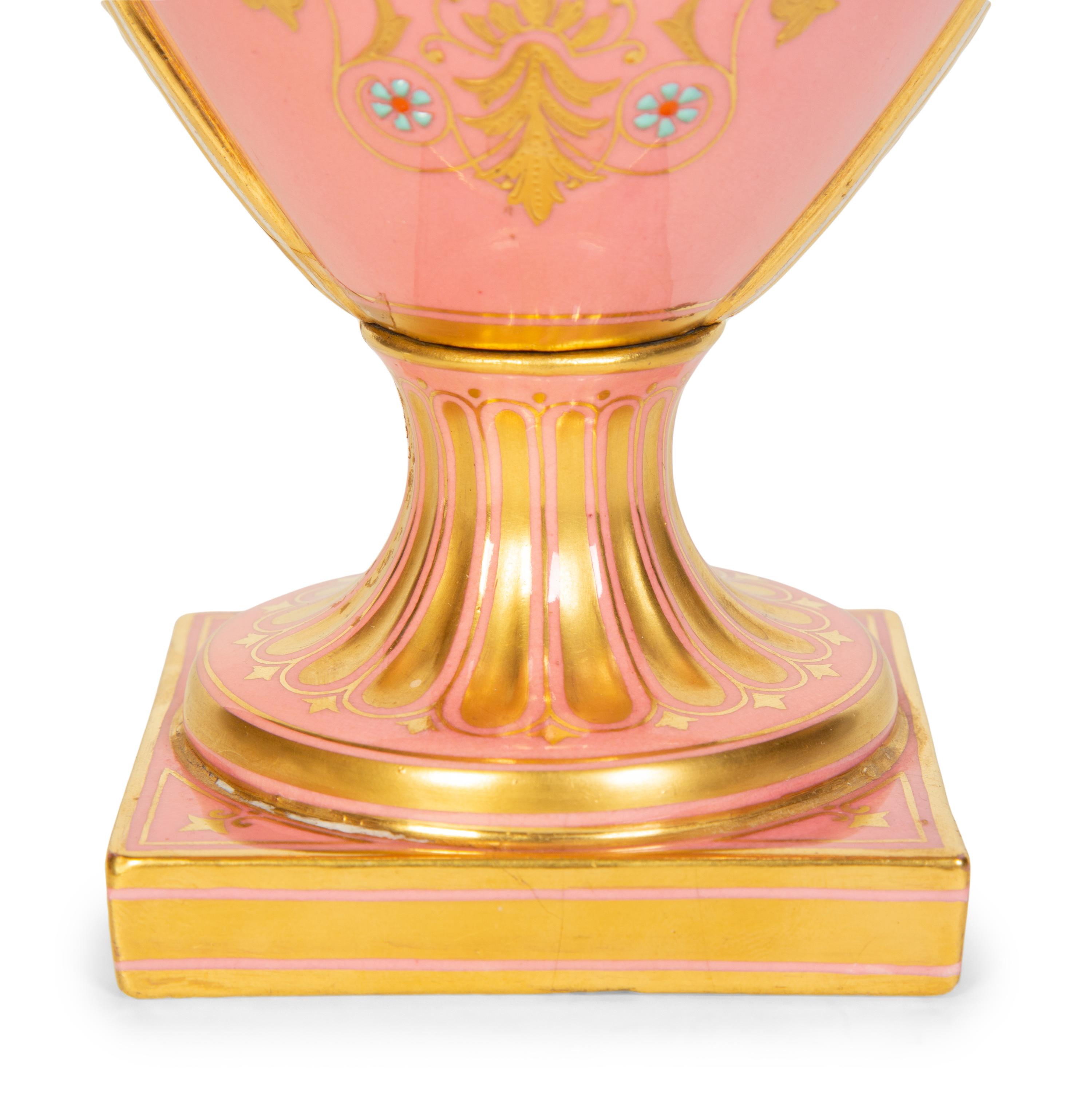 A Coalport Porcelain Pink-Glazed Urn