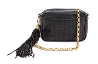 A Chanel Black Leather Handbag, 8.5" x 5".