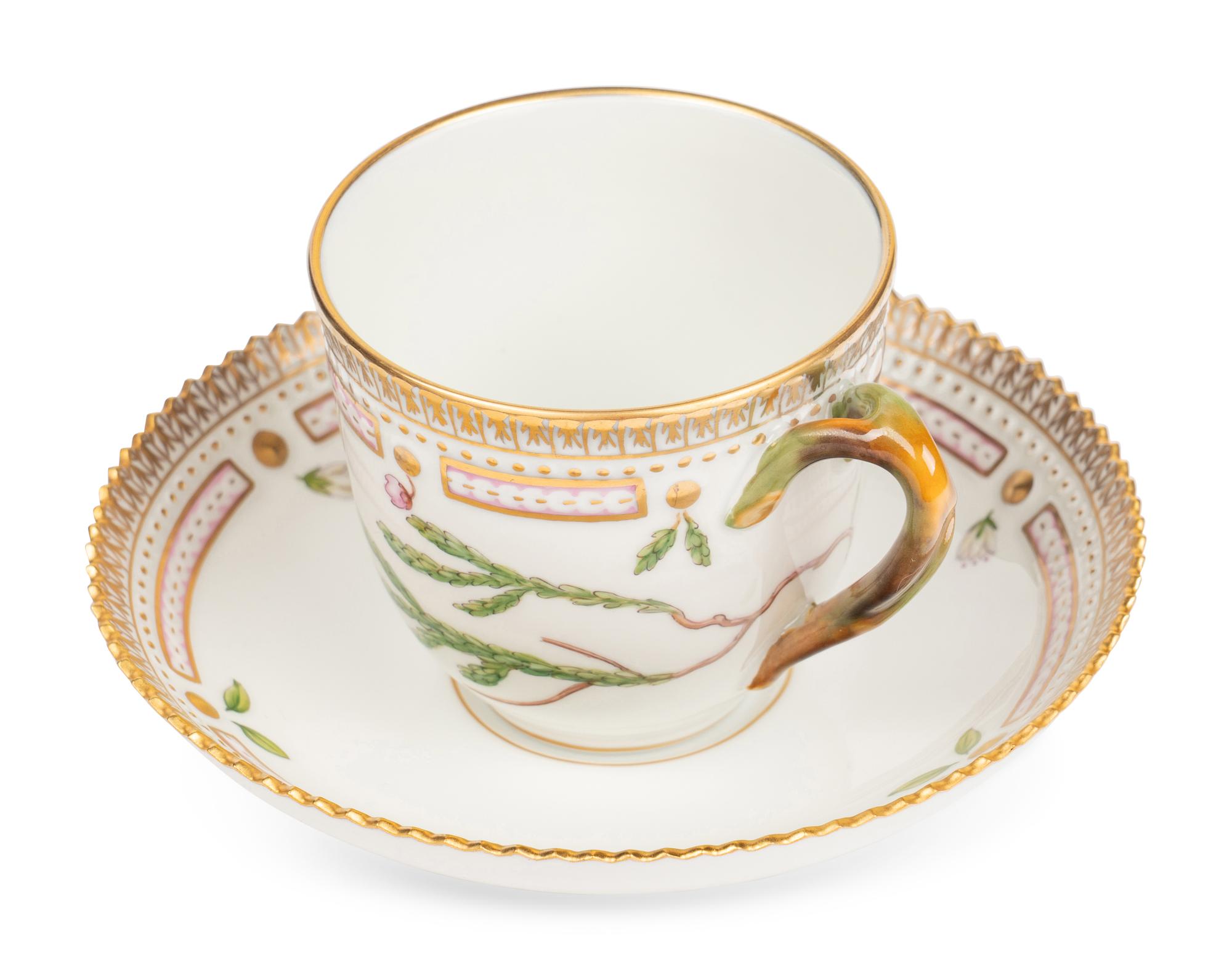 A Set of Twenty-Nine Royal Copenhagen Flora Danica Porcelain Cups and Saucers