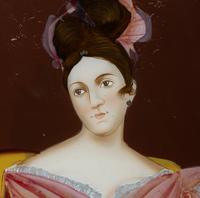 A Chinese Export Reverse Painted Glass Portrait of a Young Lady