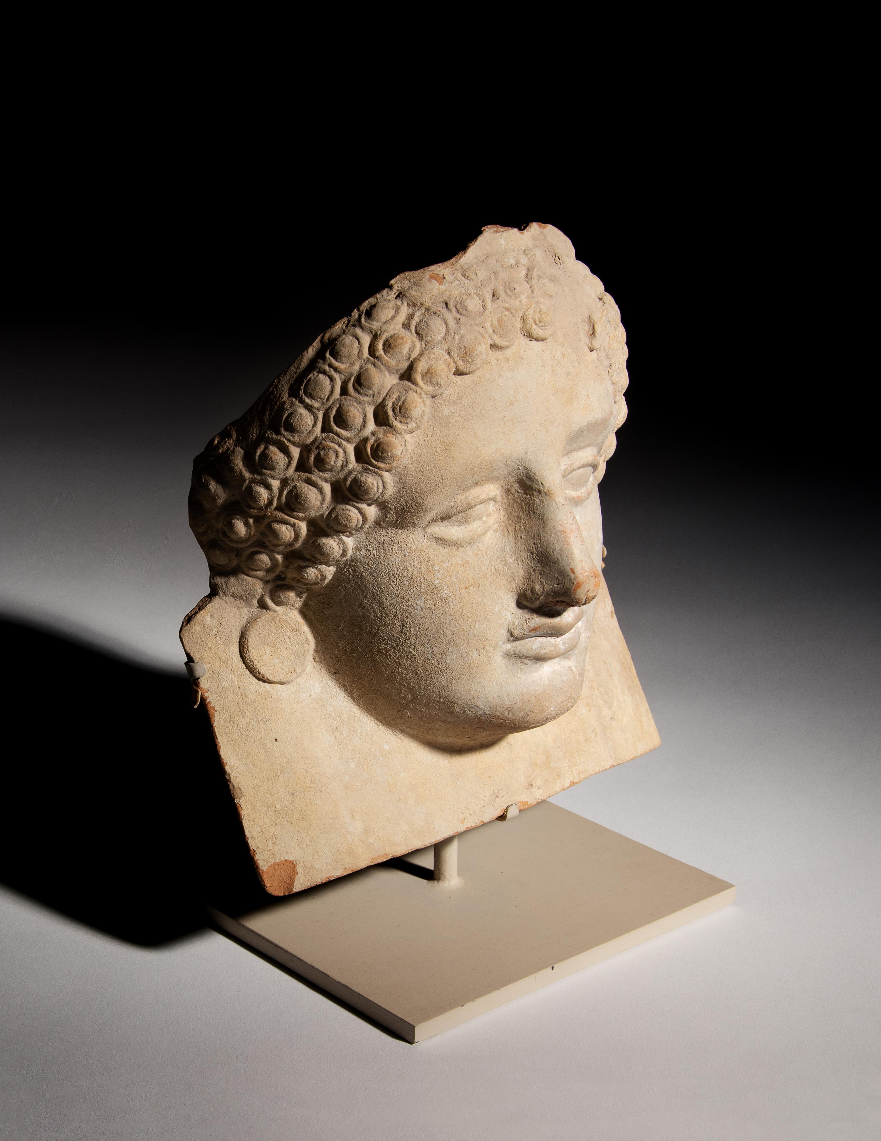 A Greek Terra Cotta Female Protome