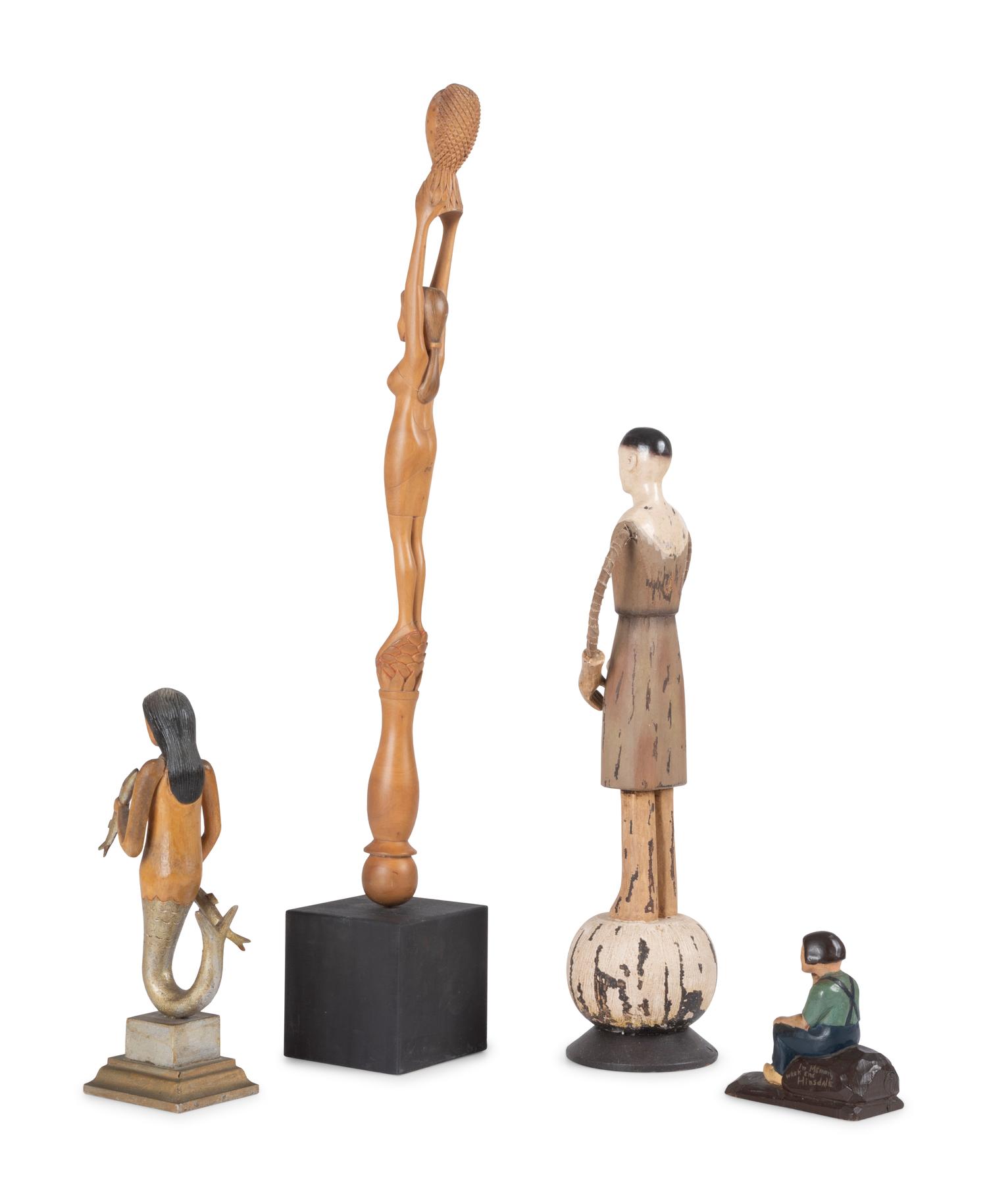 Four Carved and Painted Wooden Folk Art Figures