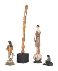 Four Carved and Painted Wooden Folk Art Figures