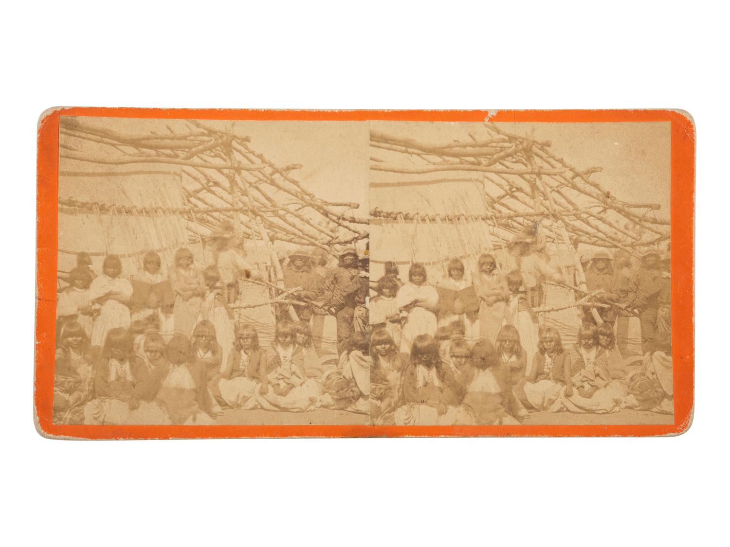 [NATIVE AMERICANS]. FLANDERS, D.P., photographer. Stereoview of Apaches at Camp Verde Spring. [Ca 1874].