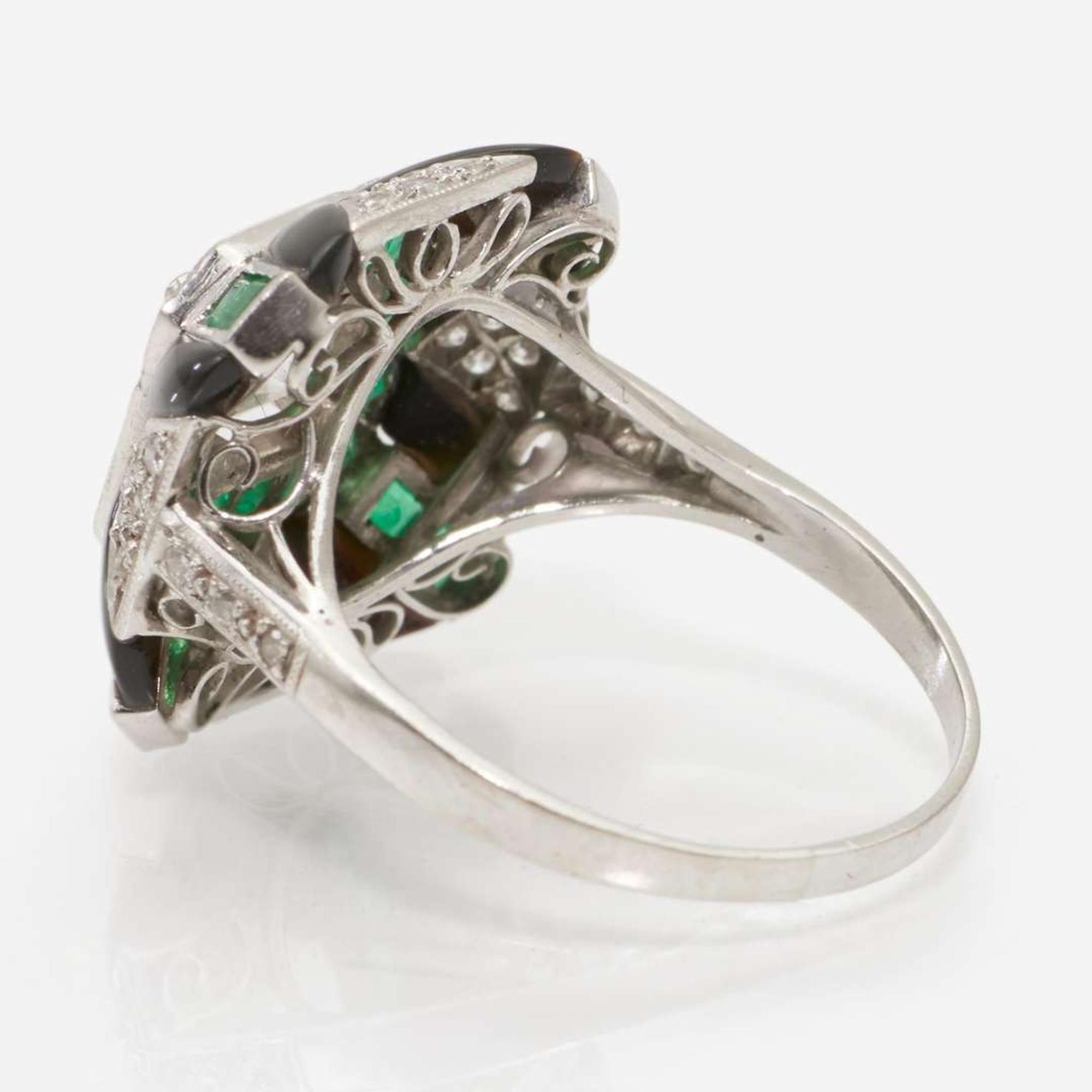 A Platinum, Diamond, and Gemstone Ring