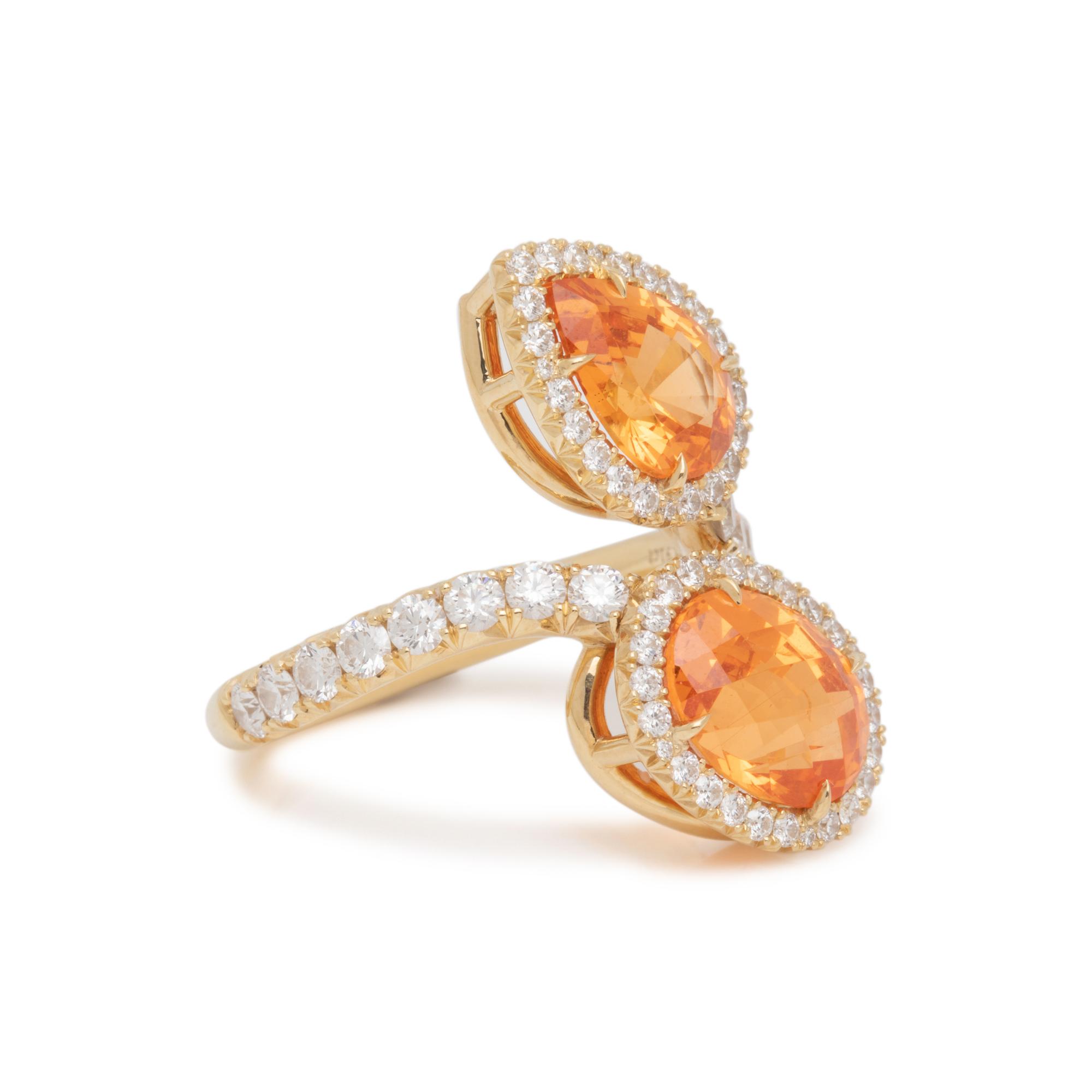 ORANGE GARNET AND DIAMOND RING
