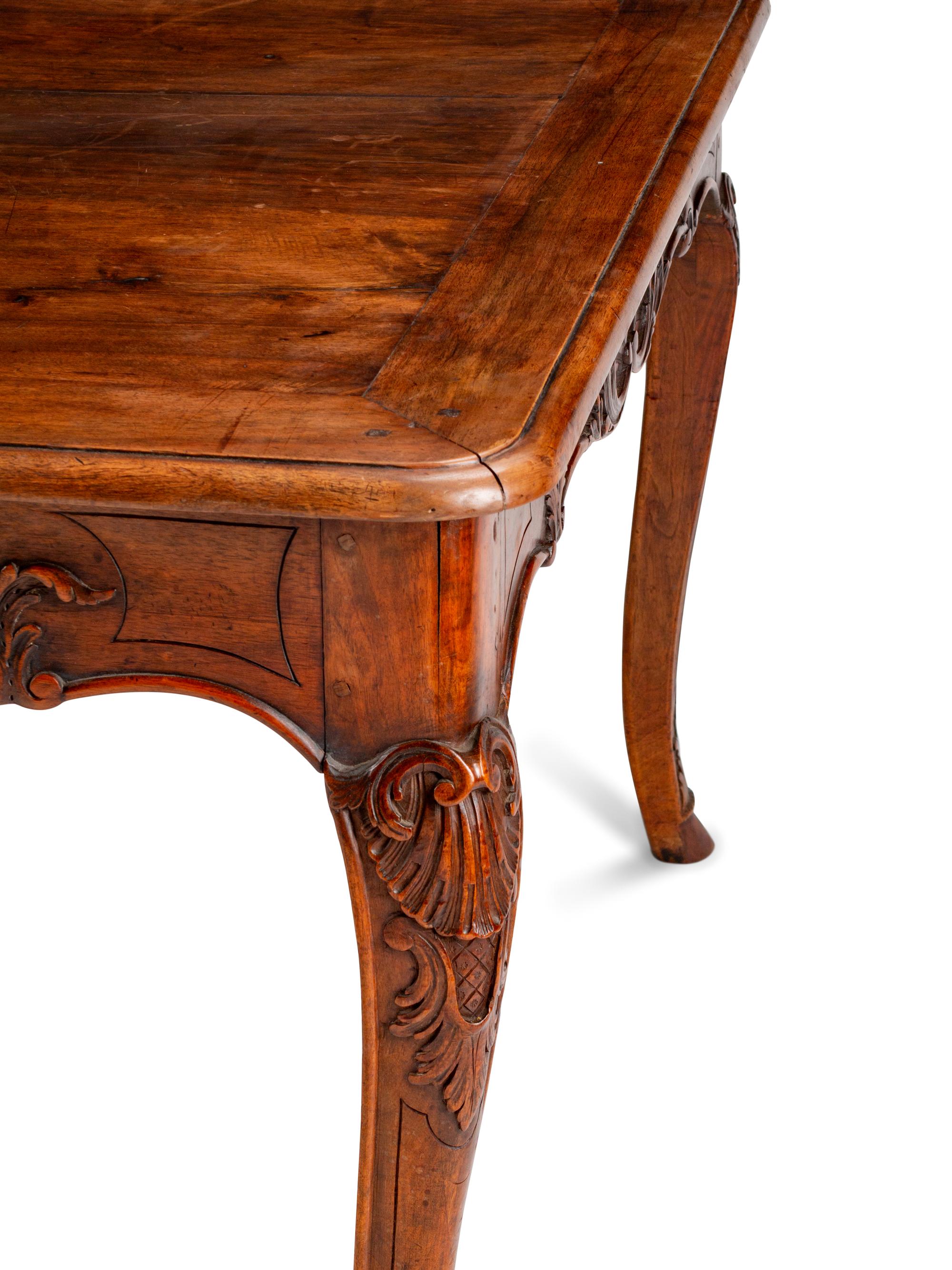A Louis XV Style Carved Walnut Table — 19TH CENTURY