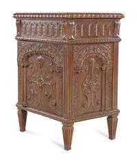 A Near Pair of Renaissance Style Carved Oak Side Cabinets
