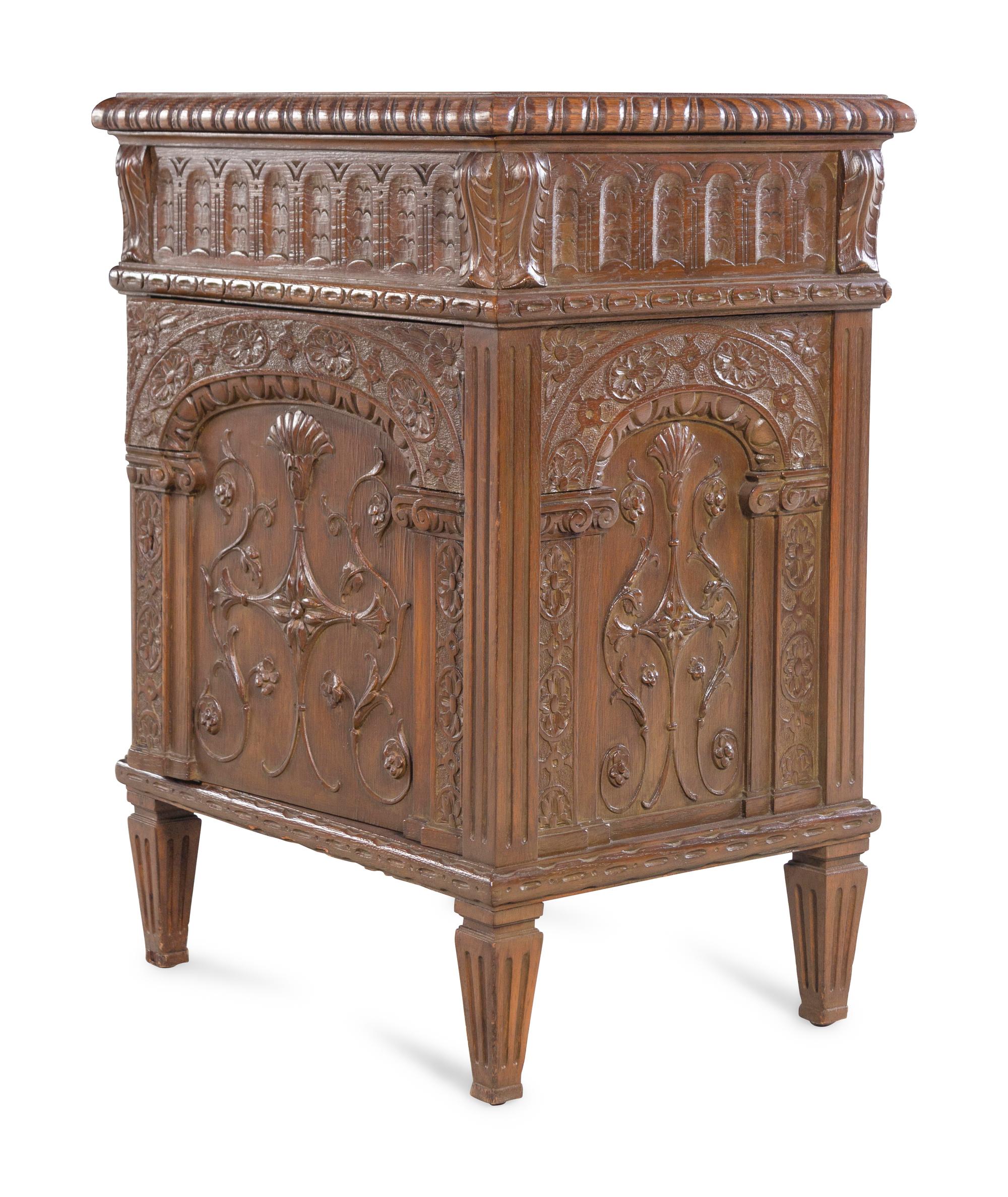 A Near Pair of Renaissance Style Carved Oak Side Cabinets