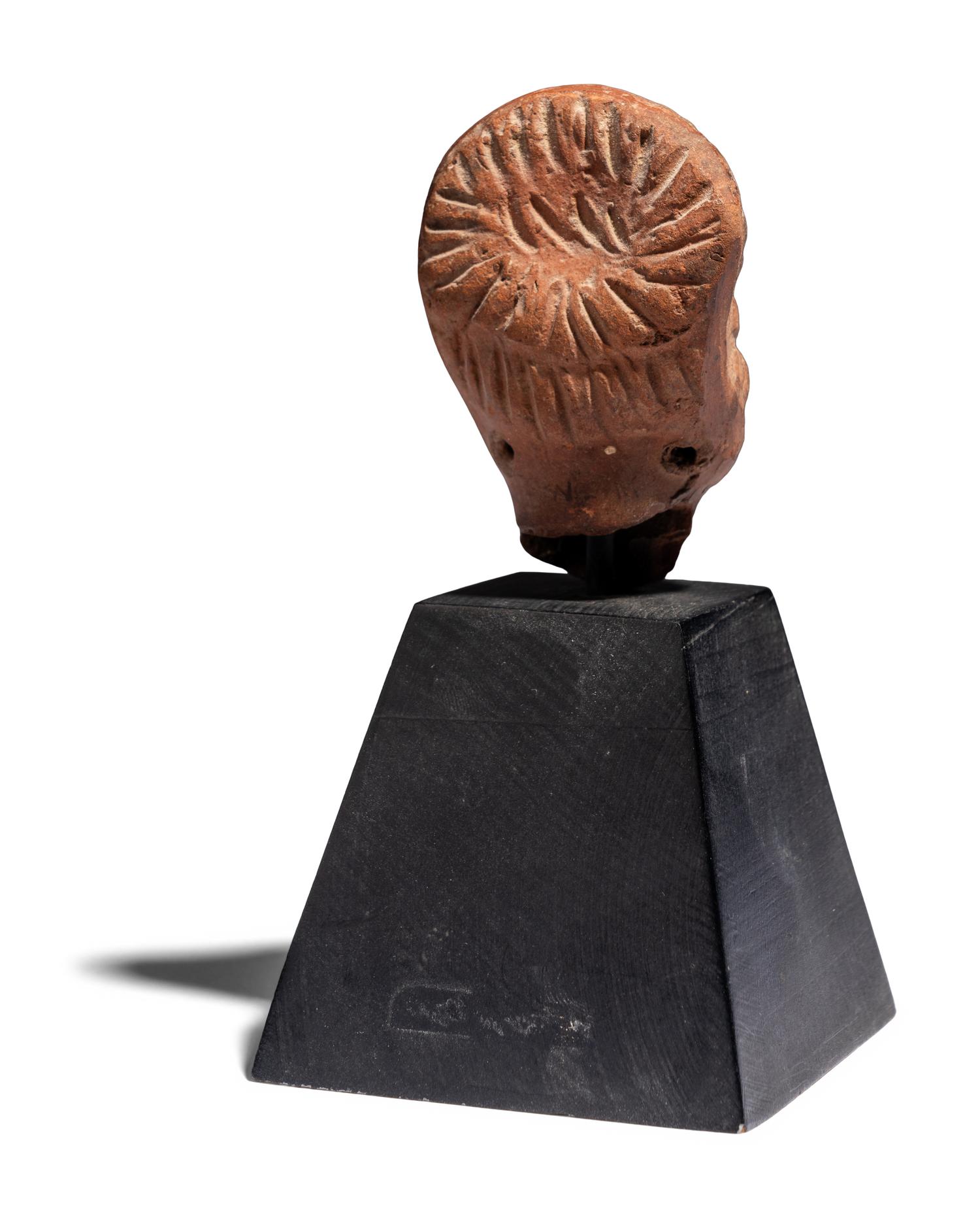 A Hellenistic Terracotta Female Head