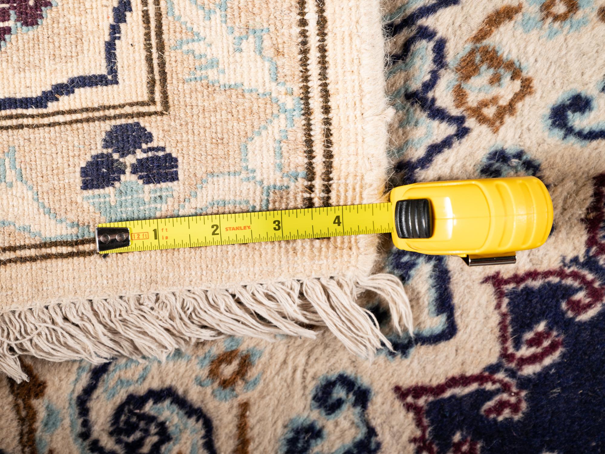 A Persian Nain Wool Rug