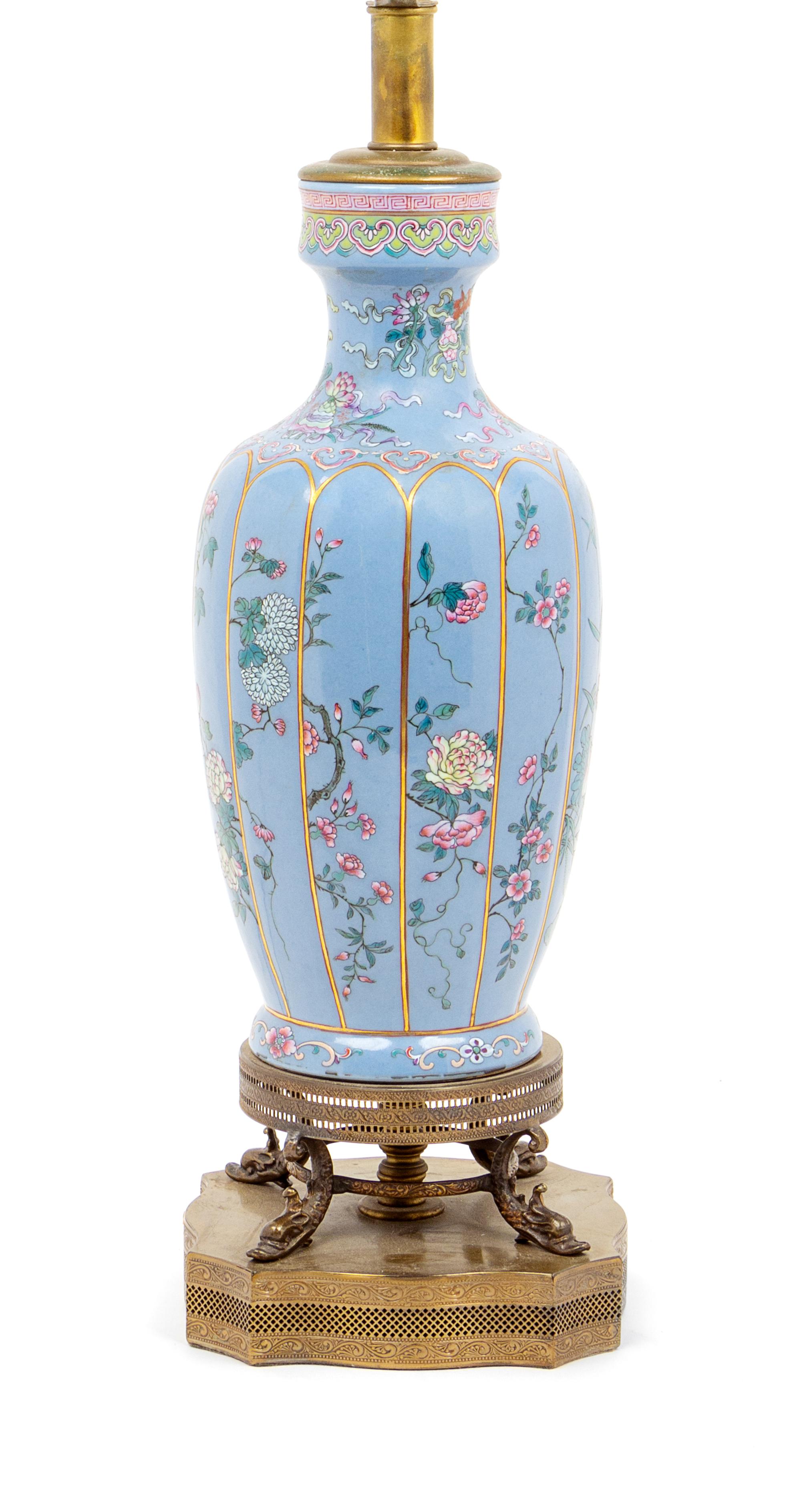 A Blue Ground Famille Rose Porcelain Vase Height of vase 12 1/4 inches. — 20TH CENTURY