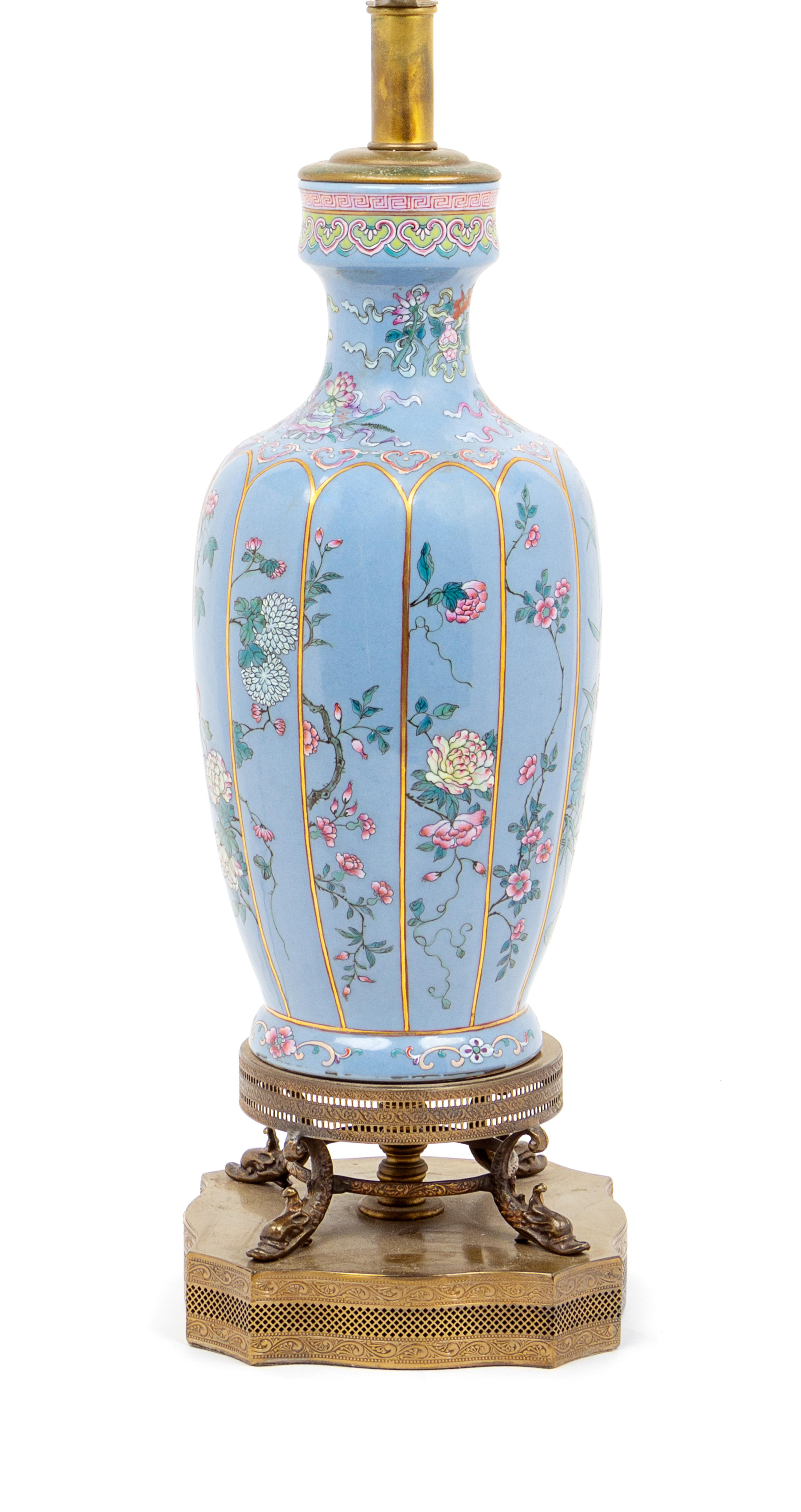 A Blue Ground Famille Rose Porcelain Vase Height of vase 12 1/4 inches. — 20TH CENTURY