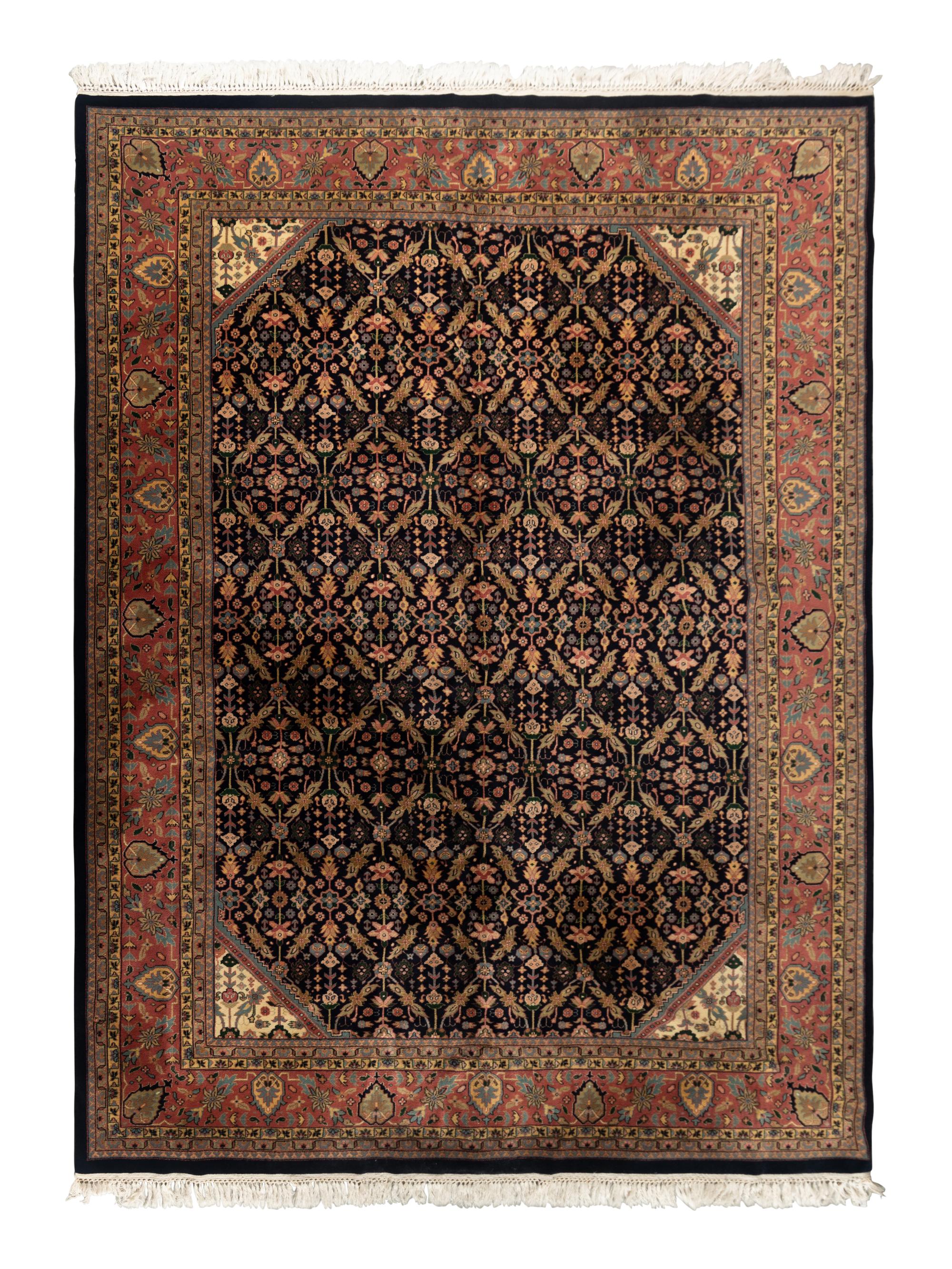 An Indo Tabriz Wool Rug