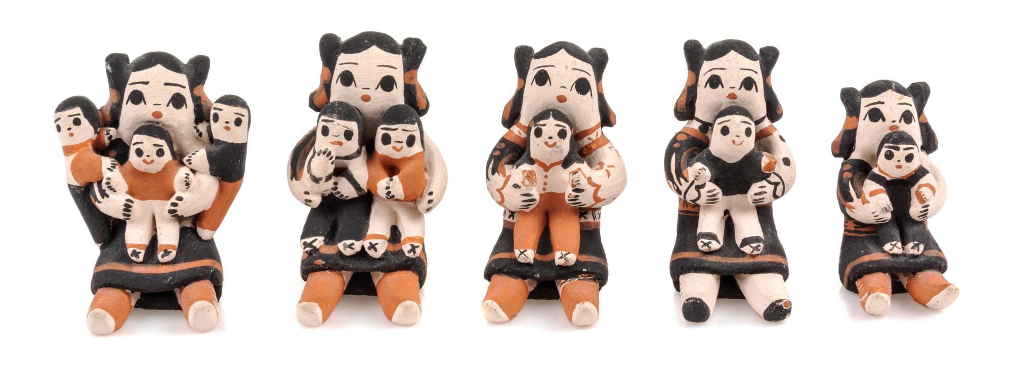 Five Pueblo Pottery Storyteller Figures Height of tallest 1 1/2 inches. — Dorothy Herrera, Cochiti, NM