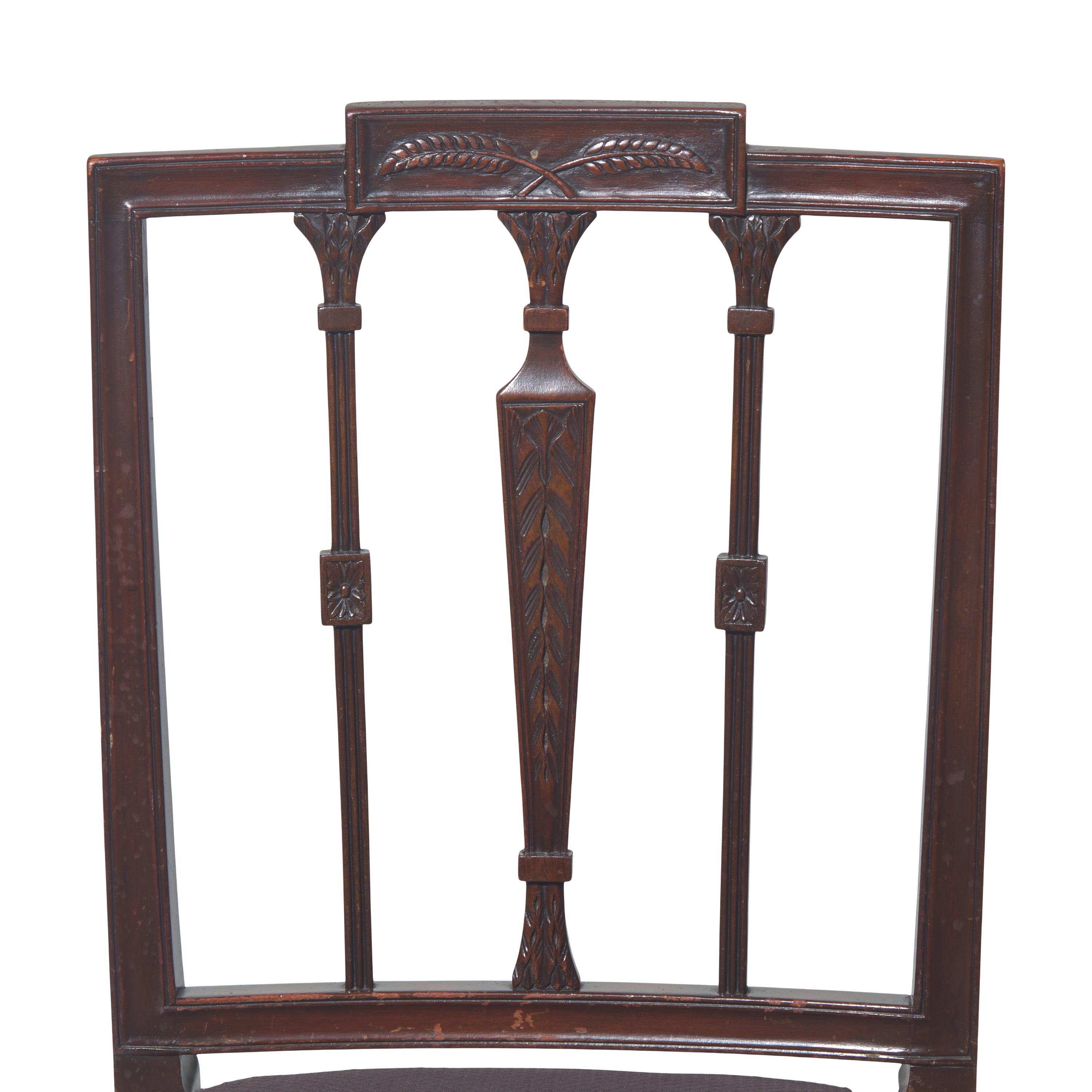 An Assembled Group of Six Federal Carved Mahogany Urn-Back and Serpentine Seat Dining Chairs