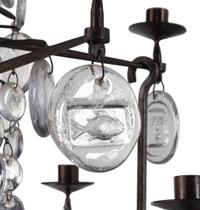 A Swedish Wrought Iron and Molded Glass Twelve-Light Chandelier