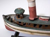 A Painted Wood Model of the Tugboat Maggie