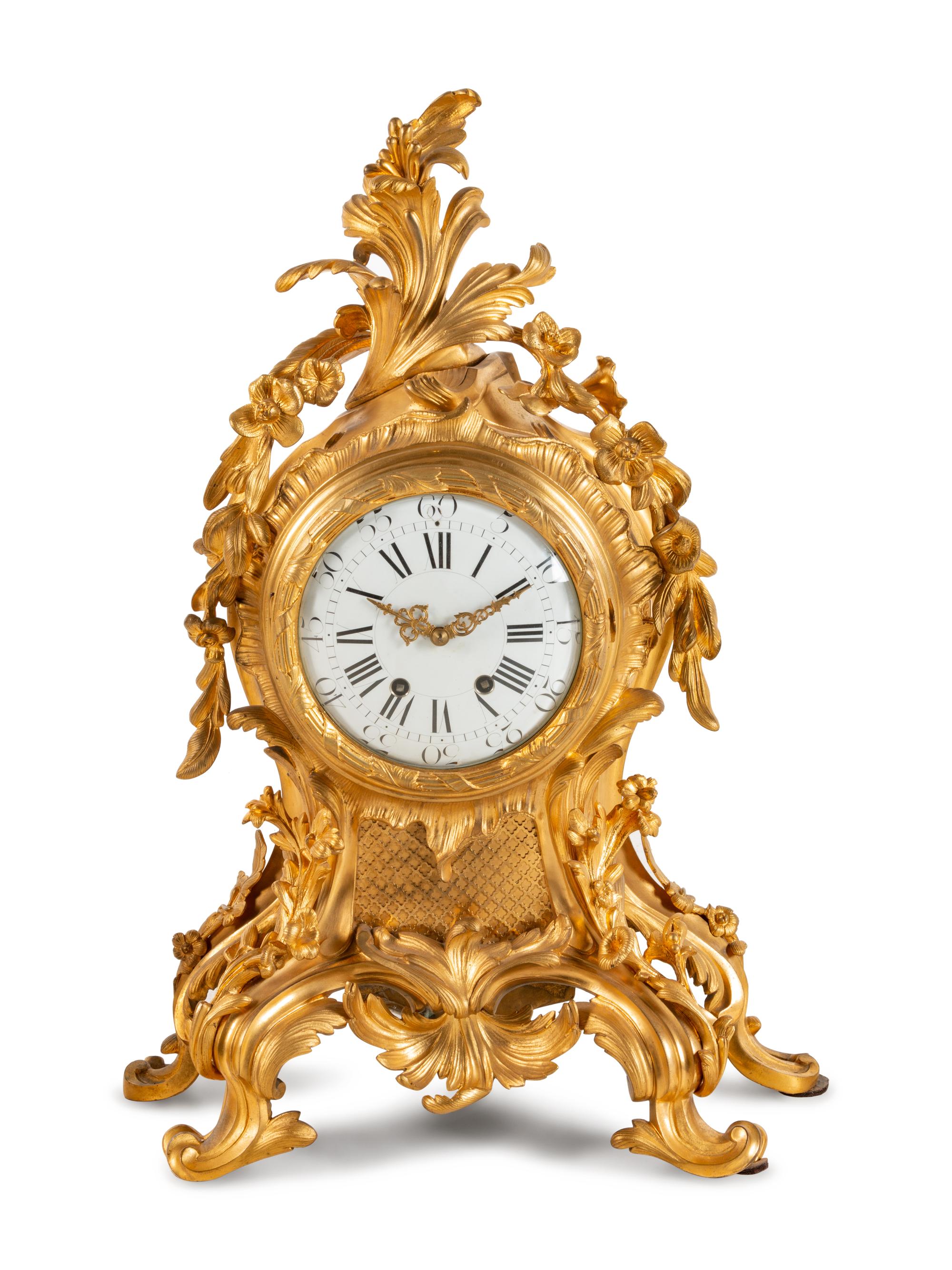 A Louis XV Style Gilt Bronze Clock Garniture