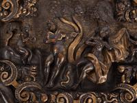 An Italian Parcel Gilt and Carved Walnut Orpheus and Eurydice Casket