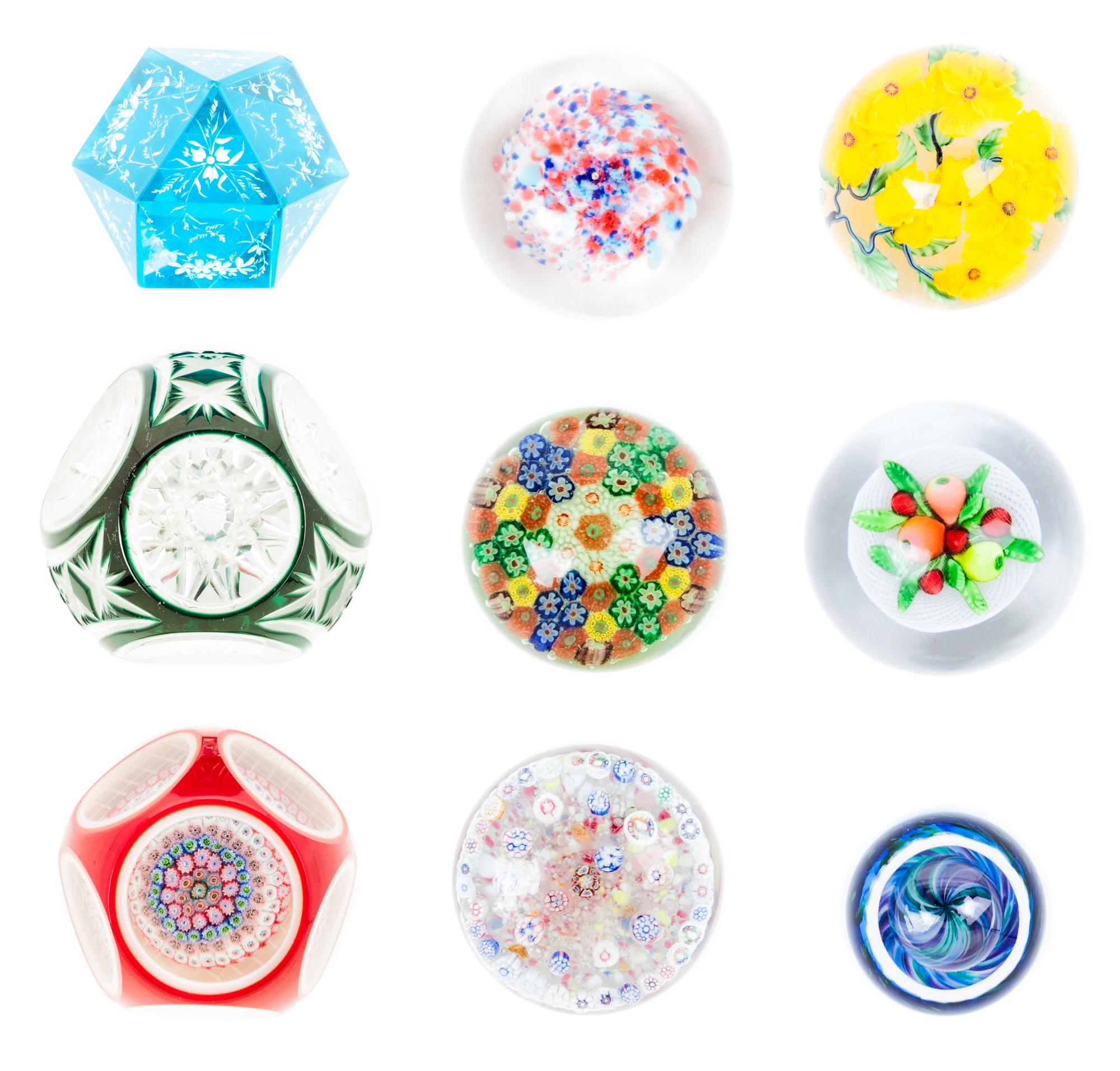 Eleven Glass Paperweights Diameter of widest 3 3/8 inches.