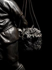 A Large Bronze Okimono of a Man