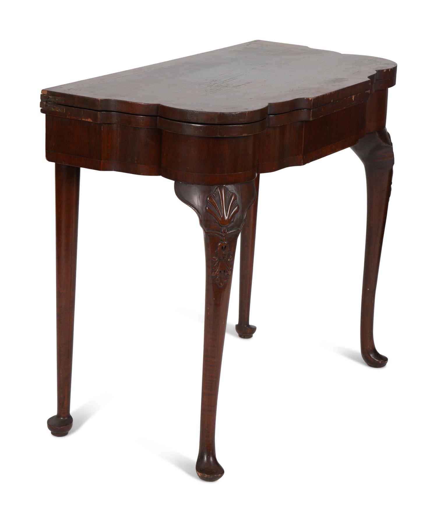 A Queen Anne Style Mahogany Flip Top Table
