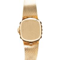 OMEGA, 14 KARAT YELLOW GOLD AND DIAMOND WATCH
