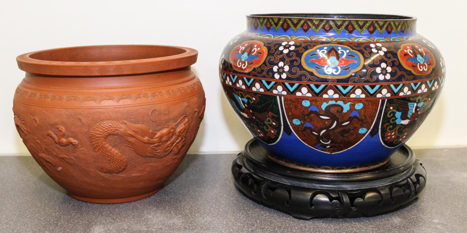 Two Chinese Cachepots Height of first 8 inches.