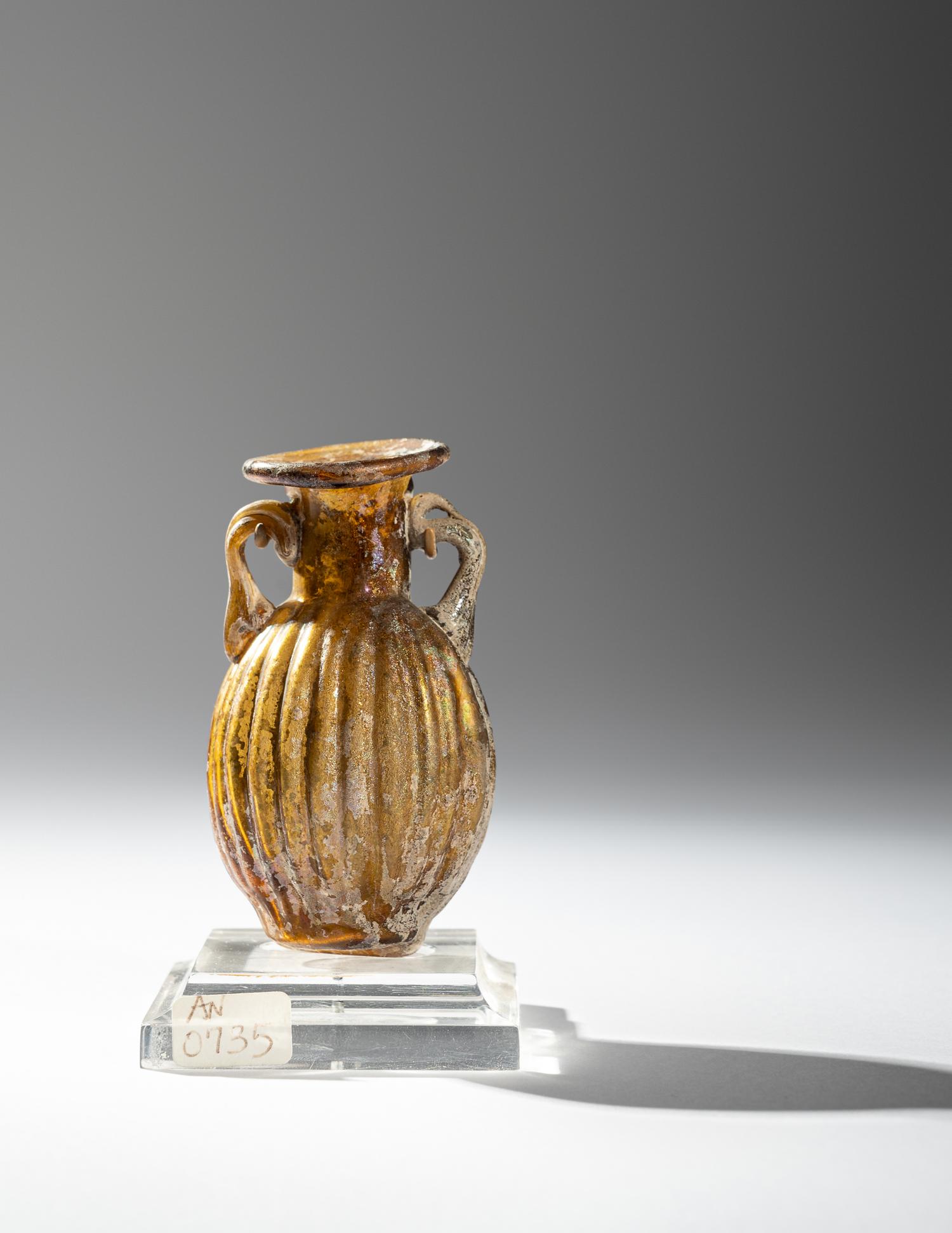 A Sidonian Yellow Glass Flask