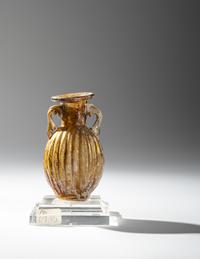 A Sidonian Yellow Glass Flask