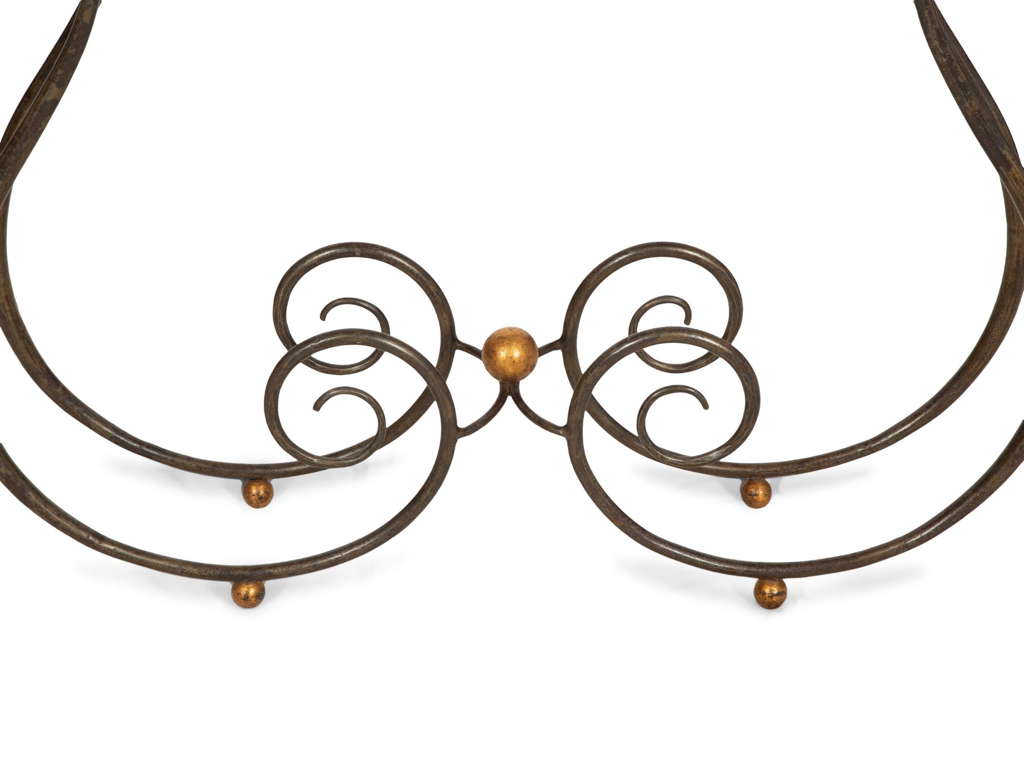A Wrought Iron and Parcel Gilt Marble Top Console Table