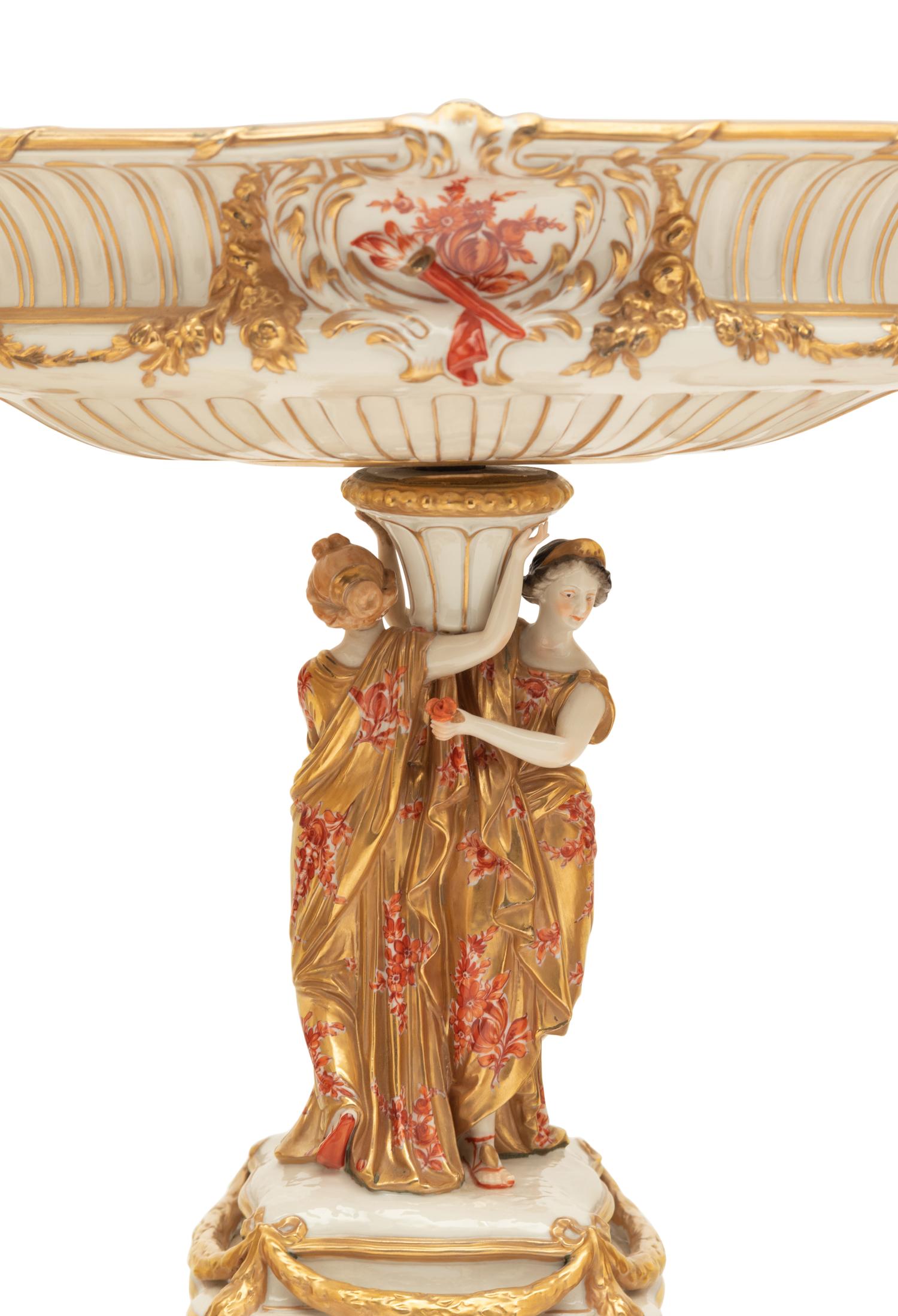 A Capodimonte Porcelain Figural Seventeen-Piece Table Garniture