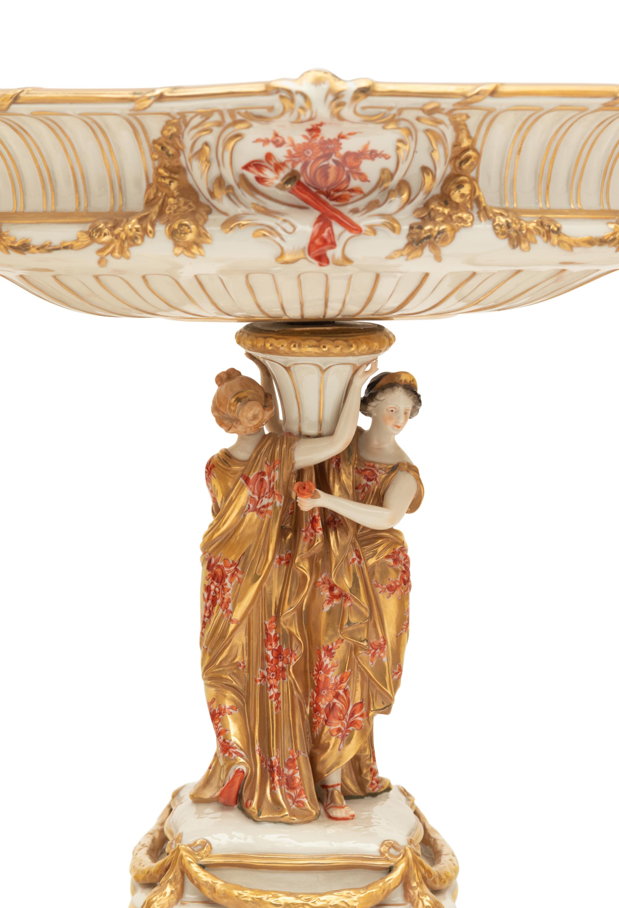 A Capodimonte Porcelain Figural Seventeen-Piece Table Garniture