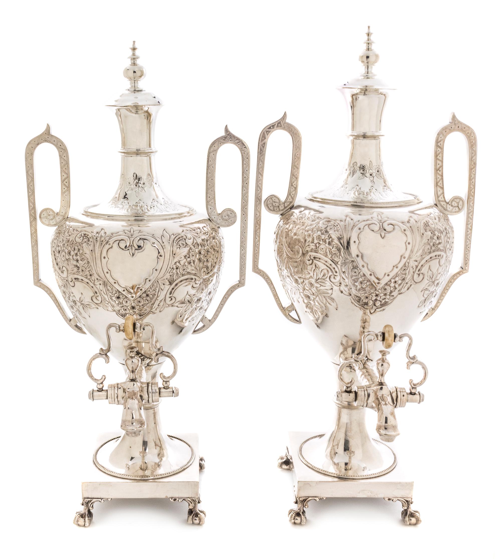 A Pair of English Silver-Plate Tea Urns, Height 20 1/2 inches.
