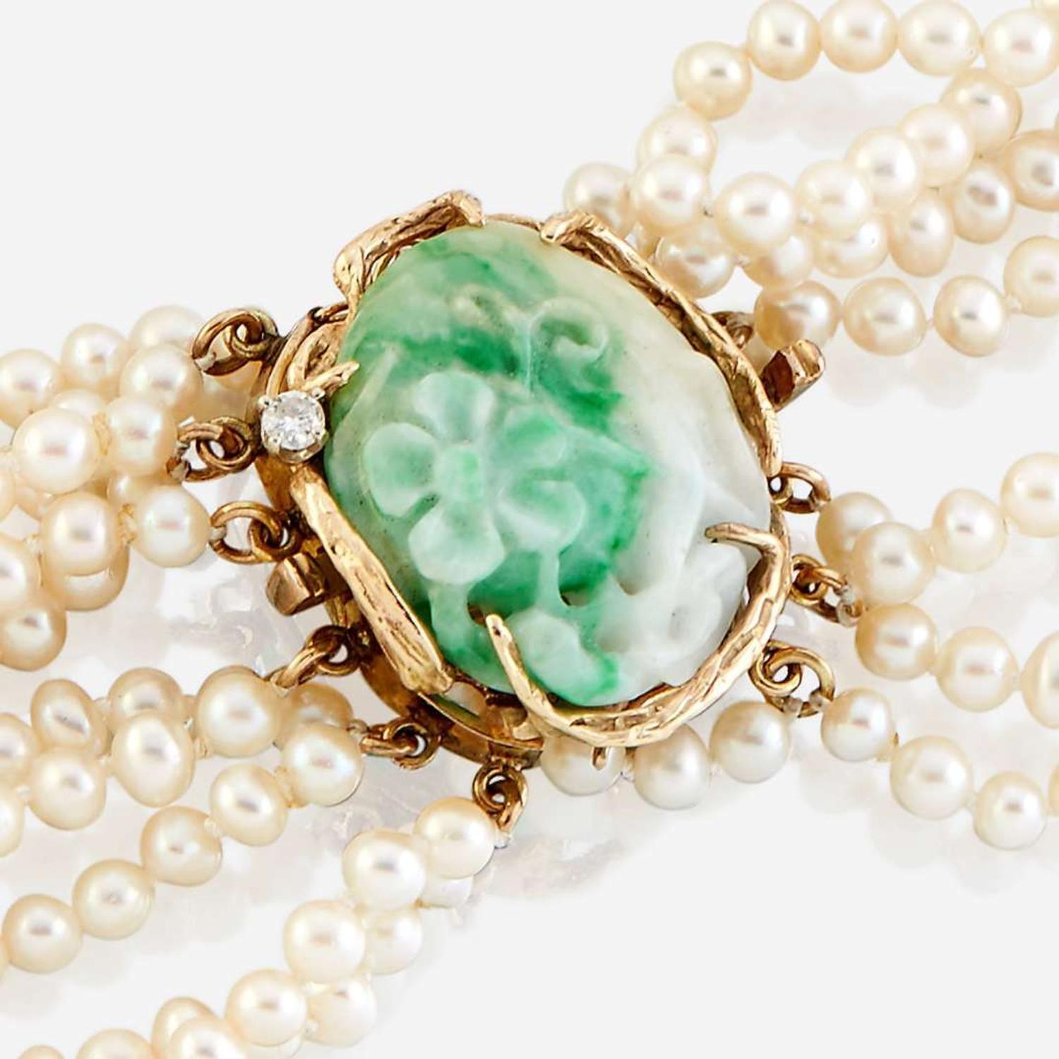 A cultured pearl, jade, diamond, and gold necklace