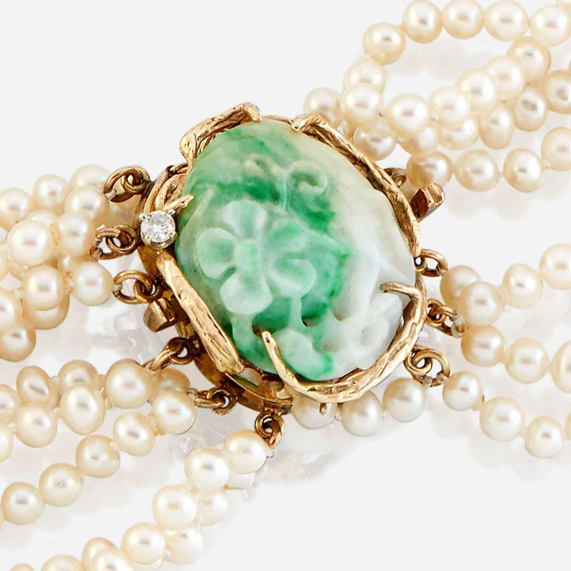 A cultured pearl, jade, diamond, and gold necklace
