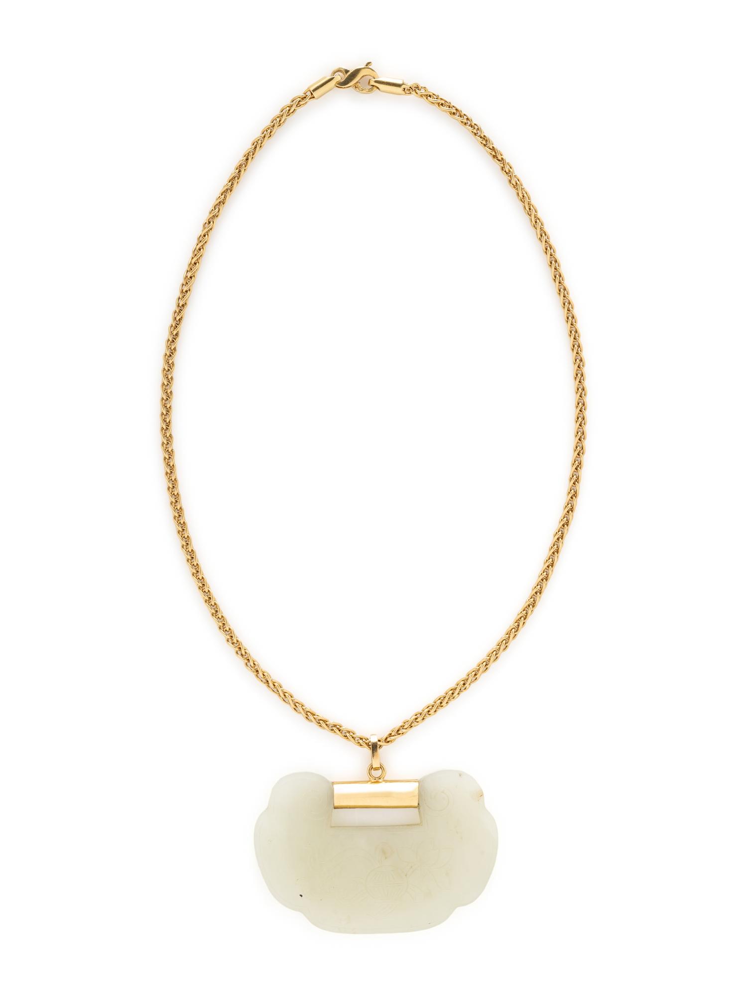 YELLOW GOLD AND CARVED JADE NECKLACE
