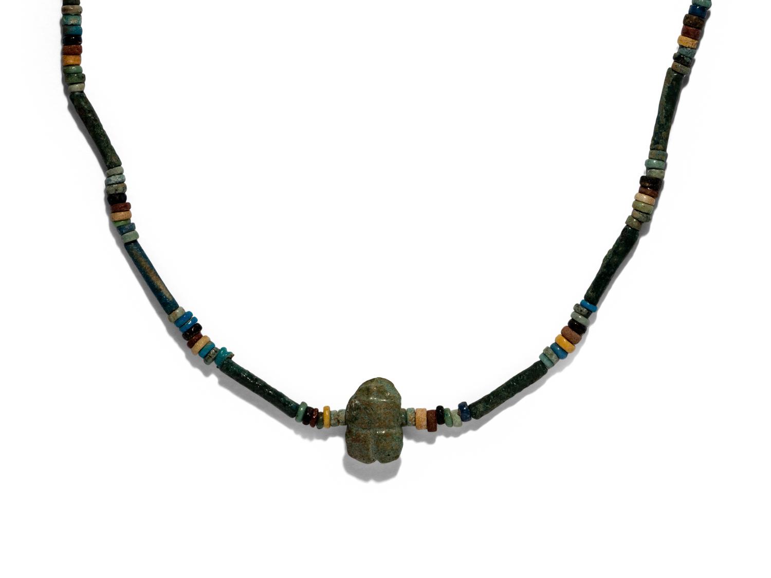 Seventeen Egyptian Faience, Stone, and Glass Objects