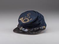 [CIVIL WAR]. Company C, 179th Pennsylvania 1858 forage cap, with identification to J.K. Hunsleker carved into visor.