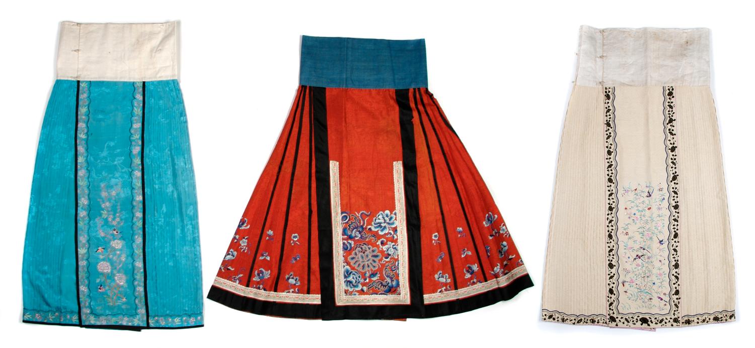 A Group of Three Chinese Silk Skirts, Length 38 inches.