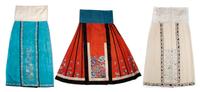 A Group of Three Chinese Silk Skirts, Length 38 inches.