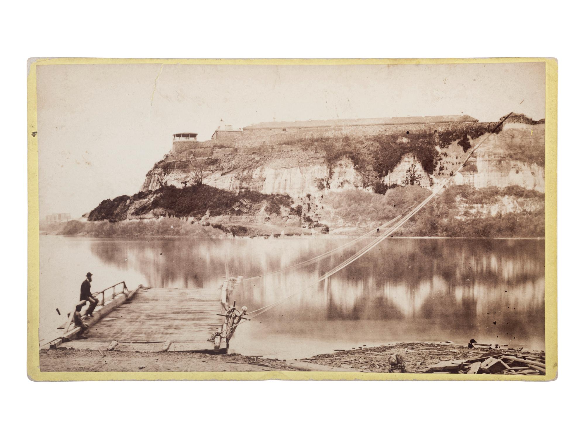 [EARLY PHOTOGRAPHY]. A collection of 13 photographs of Minnesota and Wisconsin, including landmarks, landscape views, transportation scenes, and more.