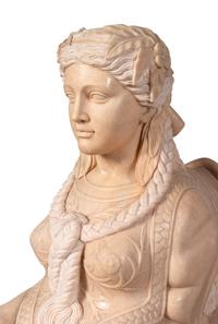 A Pair of Large Composite Marble Sphinxes