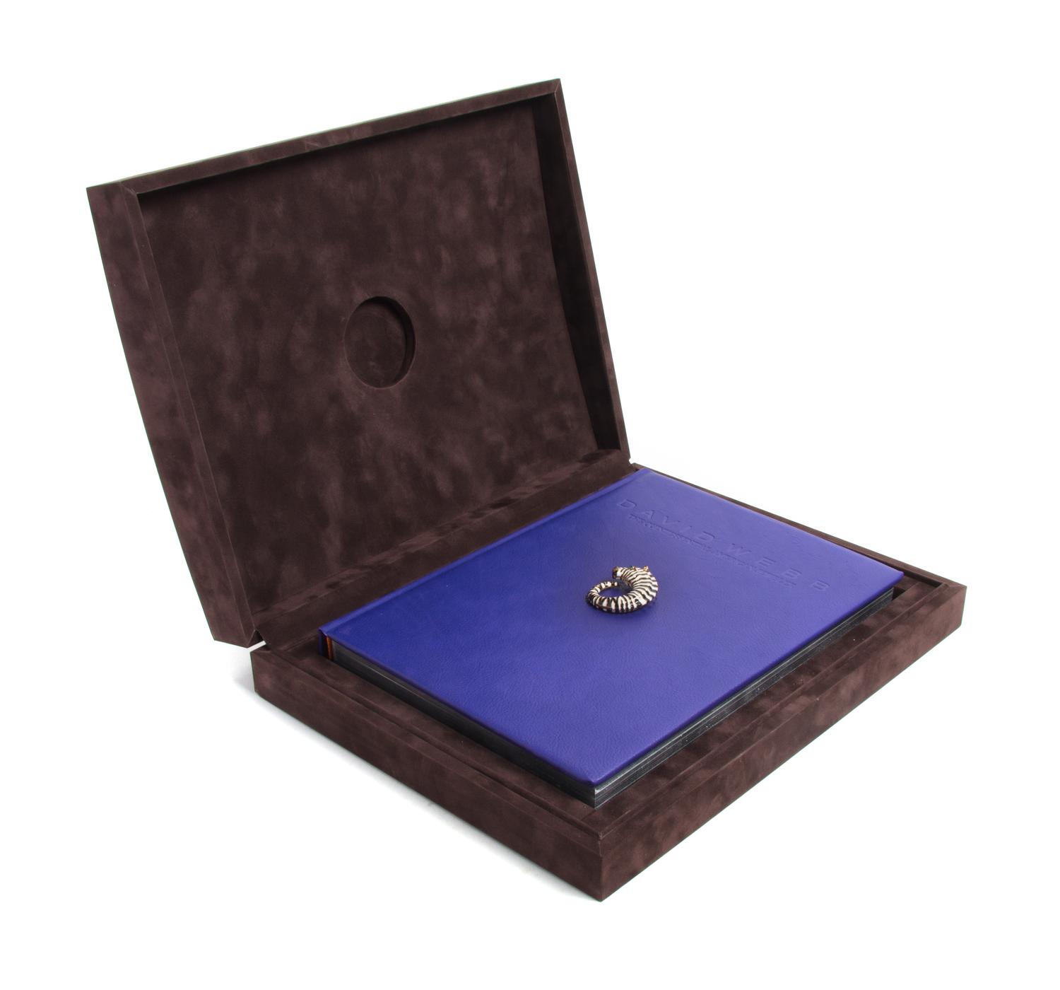 A Limited Edition David Webb Retrospective Book and Zebra Pendant, 20.70 dwts.